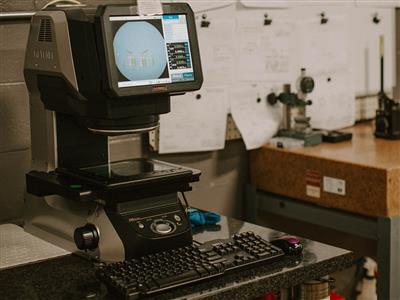 Detailed part measurement and quality control processes ensuring AS9100 compliance